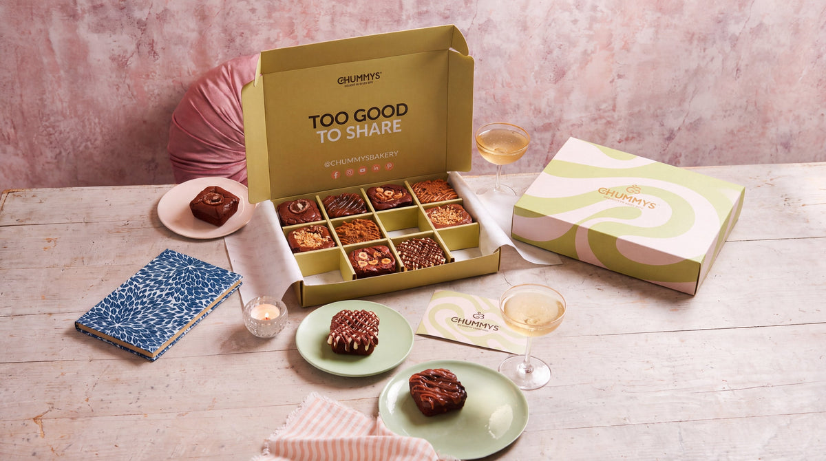 A box of twelve Chummys brownies, open beside the closed box